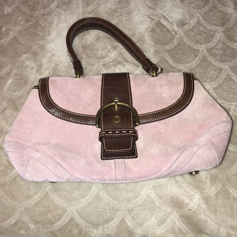 Pink and brown Coach purse.